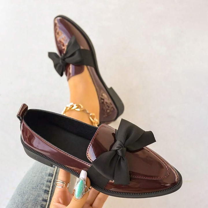 Loafers with Black Bow Details