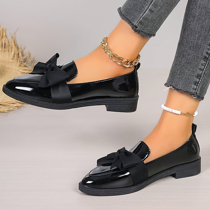 Loafers with Black Bow Details