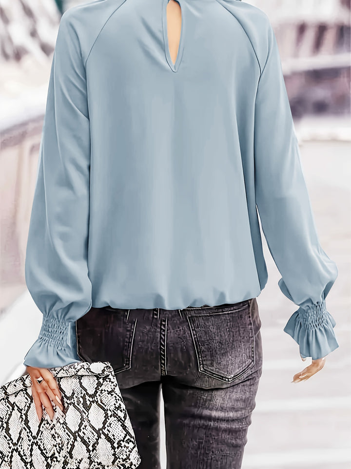 Blouse with gathered cuffs