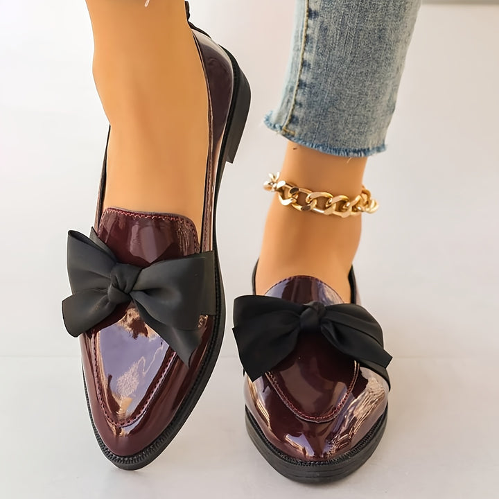 Loafers with Black Bow Details