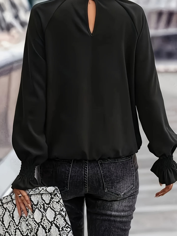 Blouse with gathered cuffs