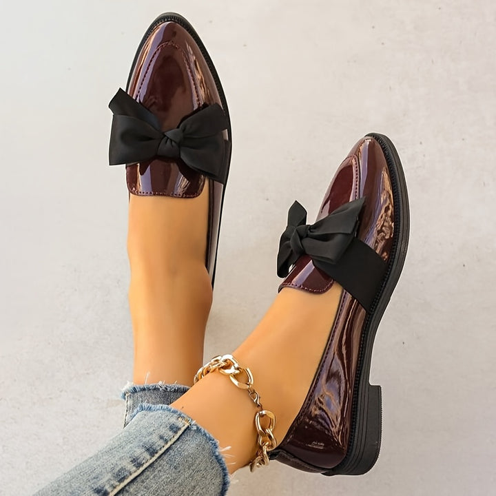 Loafers with Black Bow Details