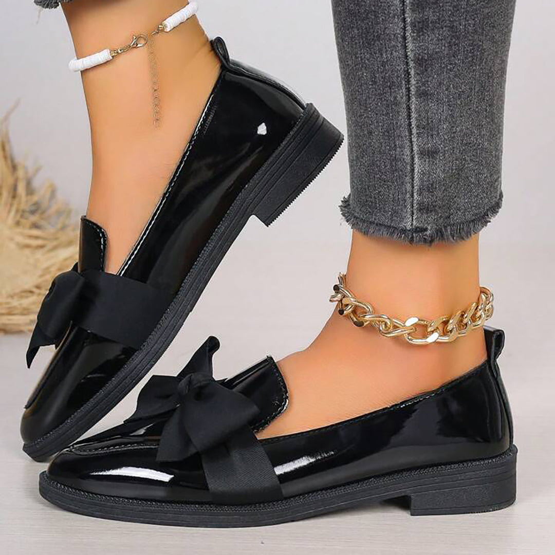 Loafers with Black Bow Details
