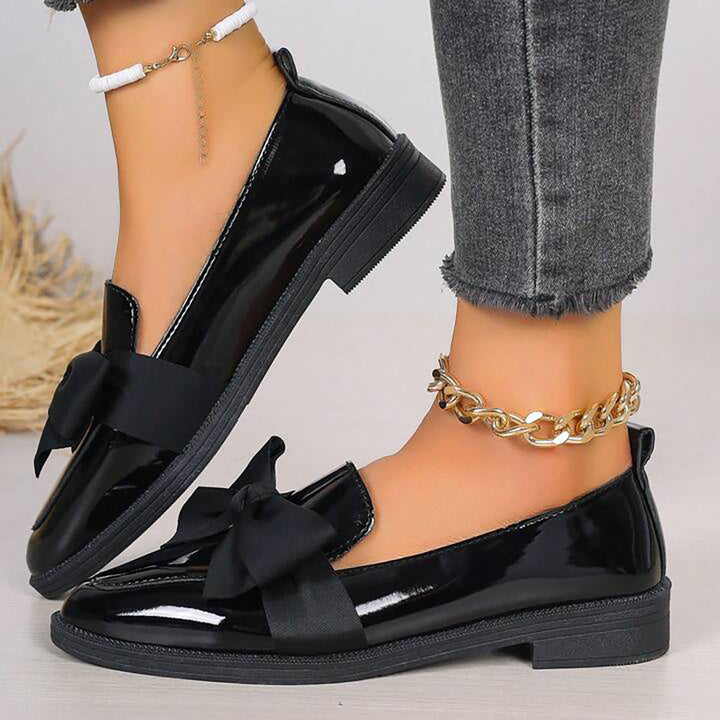 Loafers with Black Bow Details