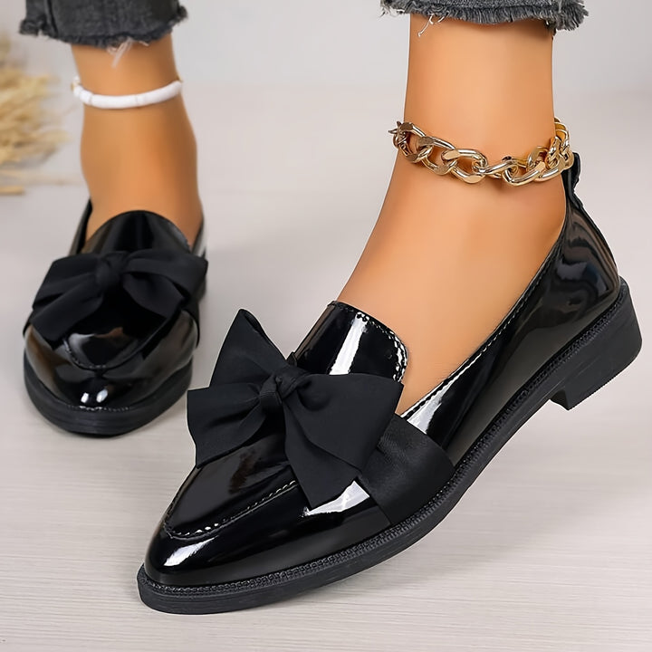 Loafers with Black Bow Details